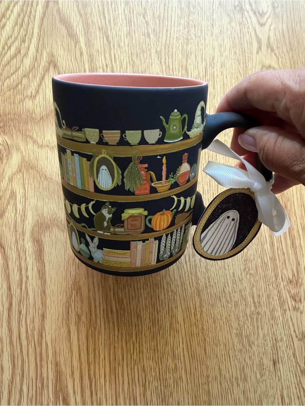 Black Ceramic Mug with Pink Interior and Seasonal Shelf Design NWT